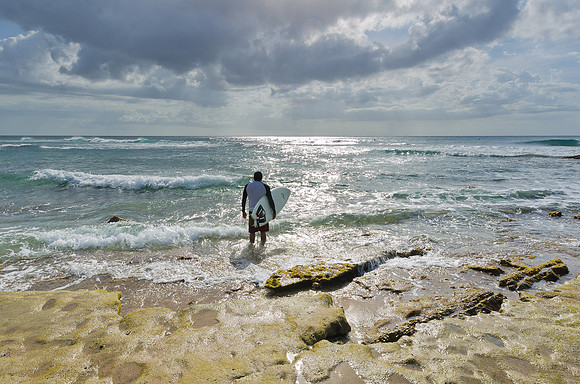 Surfer Setting Out